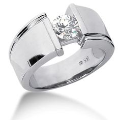 a white gold ring with a diamond in the center and two lines on each side