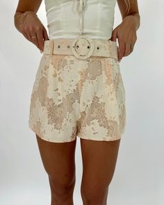 Introducing our Blush Jacquard Shorts - a versatile, trendy piece perfect for work or play. Its jacquard design adds a touch of luxury while the blush color keeps it modern and fun. Elevate any look with these gorgeous shorts that will take you from the office to a night out with ease! Shell Self 70% Cotton, 30% Nylon Lining 100% Polyester Feminine Beige Shorts For Spring, Cream Bottoms For Spring Night Out, Feminine Cream Bottoms For Work, Elegant Cream Shorts For Spring, Feminine Beige Party Bottoms, Jacquard Shorts Outfits, Chic Cream Bottoms For Party, Beige Fitted Shorts For Party, Beige Party Bottoms Short Length