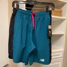 Nwt Mens Small New Balance Workout Shorts. Teal With Pink Accents. Pink Drawstring Sporty Blue Athletic Shorts With Pockets, Blue Athletic Shorts With Pockets For Running, Blue Athletic Shorts With Elastic Waistband For Gym, Blue Athletic Shorts For Jogging, Blue Athletic Shorts With Pockets For Gym, Blue Athletic Shorts For Running With Elastic Waistband, Blue Activewear With Pockets And Short Legs, Blue Athletic Shorts With Elastic Waistband For Running, Blue Athletic Running Shorts With Elastic Waistband