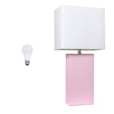 a pink table lamp next to a white light bulb on a white background with the same color as it appears