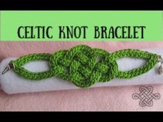 the crochet knot bracelet is made with green yarn