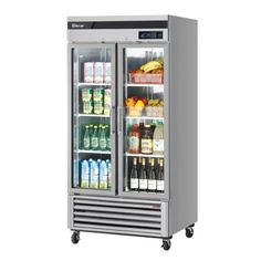 an image of a refrigerator with drinks and juices in the door, on wheels