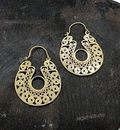 HANDMADE Beautiful hoop Bohemian earrings.  Ideal for everyday wear or for a special occasion. Handmade with high quality hypoallergenic Jewelery brass, nickel free. SIZE Aprox Length: 4.2 cm Aprox width: 3 cm LINK Please follow the link to view my shop for other beautiful pieces. https://www.etsy.com/uk/shop/JagathaStudio Small Hoop Metal Earrings For Festivals, Gold Circle Jewelry For Festivals, Gold Circular Jewelry For Festivals, Gold Circular Festival Jewelry, Metal Hoop Jewelry For Festivals, Hypoallergenic Silver Hoop Earrings In Brass, Hypoallergenic Brass Bohemian Jewelry, Brass Hoop Jewelry For Festivals, Small Metal Hoop Earrings For Festivals