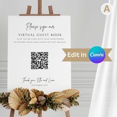 an easel with a sign that says, please go on virtual guest book and then enter to receive your own video or text message