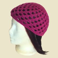 a mannequin head with a knitted hat on it's headpiece