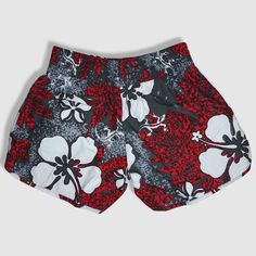 Speckled gray with red leaves and white hibiscus/plumeria/gecko pattern. Made of 100% microfiber polyester. Designed and shipped from Hawaii and made in Vietnam. Colors and fabric may vary from picture depending on cut. Red Printed Bottoms For Vacation, Red Floral Print Beach Bottoms, Red Floral Print Beach Shorts, Summer Floral Print Red Bottoms, Red Floral Print Bottoms For Beach Season, Red Floral Print Summer Bottoms, Red Printed Summer Bottoms, Red Floral Print Short Length Bottoms, Gecko Pattern