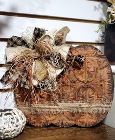 a decorative wooden box sitting on top of a table