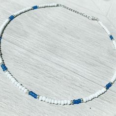 Our beaded chokers are crafted with small glass seed beads on a 13 inch flexible wire string. They are closed off with a 2 inch extension chain and lobster clasp. Feel free leave a note at checkout if you would like extra chain! Resizable Beaded Necklaces With Round Beads As Gift, Resizable Beaded Necklace With Round Beads As Gift, Adjustable Tiny Beads Choker, White Dainty Handmade Choker, Dainty Handmade White Choker, White Handmade Dainty Choker, Dainty Adjustable Tiny Beads Choker, Dainty Adjustable Choker With Tiny Beads, Handmade Dainty White Choker