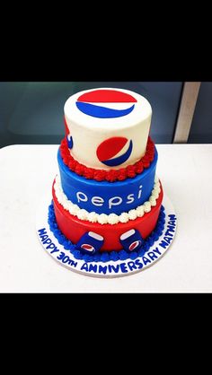 a pepsi cola cake on a white table