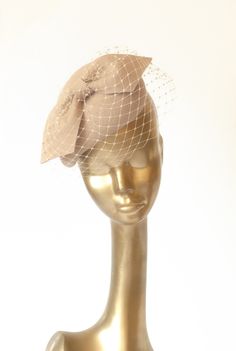 Please note that all items in my shop are made to order Unique Modern Beige Felt Fascinator. Decorated with beautiful French beige Veil Mounted with elastic rubber or headband Finished with lining and delicate petersham cotton grosgrain ribbon. If you need any info please contact me :) --------------------------- SHIPPING INFORMATION I will ship your purchased item within  7-9 business days after receiving payment to your address. Please note that shipping from Poland takes about 9 business days Adjustable Beige Headpieces For Wedding, Fitted Beige Fascinator For Vintage Events, Beige Hair Accessories For Wedding, Fitted Wedding Fascinator With Pinched Crown, Wedding Fascinator With Pinched Crown, Fitted, Beige Fascinator For Ceremonies, Beige Fitted Fascinator For Ceremony, Fitted Beige Fascinator For Ceremonies, Beige Fascinator For Wedding