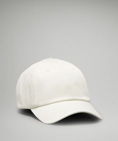 a white baseball cap on a gray background