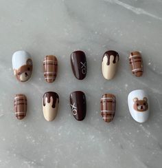 Welcome to Tigerlily Studio! Set style: Chocolate Bear All press on nails are hand-painted with gel polish on Gelx nail tips. Each order includes: - 10 nails - 1 nail glue - mini file and buffer  - cuticle pusher - alcohol wipe - instruction card Sizing: Please follow the photos above for measuring instructions and nail sizes. If none of our standard sizes work for you, select custom and fill in your nail sizes in the personalization box. Example: 0, 4.5, 4, 4.5, 7 -Model set is short length & r Nails Gel Brown, Brown Xmas Nails, Hot Coco Nails, We Bare Bears Nails, Nails In November, Brown Nail Polish Ideas, Chocolate Christmas Nails, Nail For Fall, Aesthetic Brown Nails