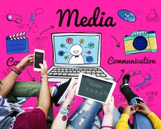 three people sitting in front of a pink wall holding up their cell phones and laptops