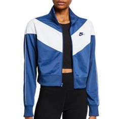 Nike Chevron Track Jacket In Blue And White. From A Huge Collection Of Unworn And Lightly Worn Wardrobe Obtained From A Major Studio Costume Department. Clothing From Shows Including Disney + Shows Big Shot With John Stamos, The Mighty Ducks: Game Changers With Emilio Estevez, Lauren Graham And Josh Duhamel, The Hit Hulu Series Saint X And Hulu Film Quiz Lady. These Were From The Show Big Shot. The Girls' Basketball Team Wore Them As Warm Up Suits And These Were Extra Back-Ups That Were Not Used Blue Sportswear Outerwear For Spring, Blue Spring Sportswear Outerwear, Blue Sportswear Track Jacket For Fall, Blue Track Jacket For Fall Sportswear, Blue Track Jacket For Fall, Nike Blue Track Jacket For Spring, Nike Blue Outerwear For Fall, Blue Nike Outerwear For Fall, Blue Nike Track Jacket In Athleisure Style