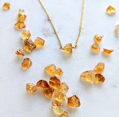 Citrine 🧡 What an amazing little stone. Citrine is a yellow/orange genuine gemstone, mined mainly from Brazil. I have a HUGE citrine Crystal chunk in my apartment and love her mood 🔶 This neckalce is a RAW citrine, untreated, with alot of natural edges and surfaces for the light to reflect. I offer this in both stainless steel and tarnish free gold plated chains. These are both extremely high quality and come as 18 inches. Just choose your chain material at checkout 🧡 have a wonderful day and Orange Citrine Birthstone Necklace, Amber Citrine Necklaces For Anniversary, Amber Citrine Necklace For Anniversary, Orange Citrine Gemstone Necklace, Amber Crystal Necklaces For Gifts, Citrine Crystal Necklace Natural Stones Gift, Citrine Crystal Necklace As A Gift, Yellow Crystal Gemstone Bead Necklace For Gifts, Gift Citrine Crystal Necklace With Natural Stones