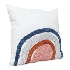 a white pillow with a multicolored circle design on the front and back of it