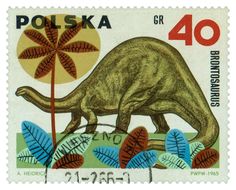 a stamp with an image of a dinosaur