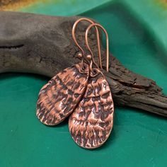 "These Nature Inspired Earrings are ALL Hand Crafted by Me in my Studio in your choice of Sterling Silver, Copper, White Copper*, or Bronze. The interesting ripple texture of these earrings comes from the Polypore or Tree Bracket Fungi. Polypores are one of the most efficient decomposers of wood and plant material. Through the decomposing of tree trunks, they recycle a major part of nutrients in land ecosystems. The designs of this texture are naturally endless! Each teardrop dangle is hand scul Unique Hypoallergenic Drop Earrings, Hypoallergenic Copper Dangle Earrings, Artisan Hypoallergenic Drop Earrings, Artisan Teardrop Earrings For Pierced Ears As Gift, Artisan Teardrop Earrings As Gift, Unique Hypoallergenic Copper Earrings, Artisan Hypoallergenic Earrings As Gift, Handmade Copper Teardrop Earrings For Gift, Single Copper Drop Earring