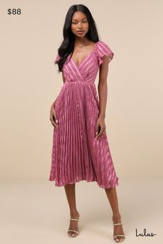 When it comes to event dressing, you'll be a step ahead with chic pieces like the Lulus Standout Sophistication Mauve Lurex Flutter Sleeve Midi Dress! This radiant dress is composed of lightweight woven fabric with a subtle striped burnout design accented by Lurex threading. Short flutter sleeves (with elastic at the shoulders) frame a surplice bodice with a stunning V-back, crossed by a single tie. Skirt has a classic, A-line silhouette and finishes at a midi hem. Hidden zipper/clasp at back. F Lurex Dress, Tie Skirt, Adhesive Bra, Dress A Line, Dresses Xxl, Flutter Sleeve Dress, Sleeve Midi Dress, Midi Dress With Sleeves, Flutter Sleeves