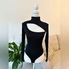 New Body, Sexy, Black, Long Sleeves, Ideal For Any Occasion. Sizes Xs, S, And L Edgy Fitted Bodysuit For Club, Black Fitted Edgy Bodysuit, Fitted Black Bodysuit For Club, Black Stretch Bodysuit With Edgy Style, Edgy Black Stretch Bodysuit, Fitted Black Bodysuit For Night Out, Fitted Black Trendy Bodysuit, Black Fitted Bodysuit For Night Out, Black Fitted Trendy Bodysuit