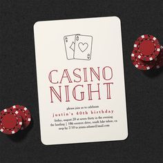 the perfect pair wedding card and poker chips on a black table with red dices