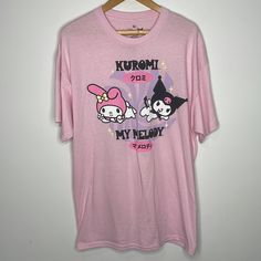 New Without Tags, Still Has The Plastic Thing From The Tag Kuromi And My Melody By Sanrio Size Xl Short Sleeve Crewneck T-Shirt Pink With Japanese Front And Back Graphic 100% Cotton Pink Graphic Print T-shirt For Loungewear, Pink Kawaii Shirt For Spring, Pink Short Sleeve Top With Hello Kitty Print, Kawaii Pink Tops With Graphic Print, Pink Short Sleeve Kawaii Top, Pink Hello Kitty Graphic Tee, Kawaii Pink Tops With Letter Print, Pink Short Sleeve Shirt For Loungewear, Pink Hello Kitty Print Top For Loungewear