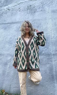 Hand knit Ikat cardigan. Super oversized cardigan. Unisex chunky knit coat. Cozy granny square cardigan. Large cardigan for men and women.  Available for order in one size: width: 27.5"/70 cm length: up to 31.5"/80 cm sleeve: 23.6"/60 cm Choose from wide range of colors to create your own super cardi. Colors can differ because of the personal screen color reception. Choose one primary color and contact me for secondary colors. Will be shipped within 3-4 working weeks by airmail. Tracking will be available. Your order will be packed securely into a carton box. We provide eco-packing. Handwash only. Dry flat. Steam. Do not bleach. Do not iron. Keep folded, do not hang. WHEN YOU PLACE YOUR ORDER  YOU AGREE WITH MY SHOP POLICIES Cozy Winter Cardigan With Granny Squares, Cozy Granny Square Cardigan For Winter, Cozy Winter Granny Square Cardigan, Casual Granny Square Cardigan For Winter, Cozy Granny Square Sweater For Winter, Oversized Granny Square Cardigan For Fall, Oversized Fall Cardigan With Granny Square Details, Oversized Crochet Sweater Coat For Fall, Cozy Oversized Crochet Outerwear