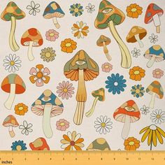 an image of mushrooms and flowers on white fabric with yellow ruler in the foreground