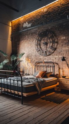 a bed sitting on top of a wooden floor next to a wall with a clock