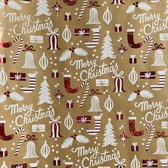 christmas wrapping paper with white and red designs on it