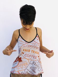 PRODUCT INFO: REVERSIBLE - Double sided prints; Two tops in one Made from Recycled Water Bottles / Spandex UPF PROTECTION FROM THE SUN CARE INSTRUCTIONS:Hand wash & hang dry recommended or machine wash cold on low cycle with like colors. Fitted Graphic Print Tops For Loungewear, Coffee Graphic Print Tops For Summer, Coffee Graphic Print Top For Summer, Summer Coffee Colored Tops With Graphic Print, Sleeveless Graphic Print Tops For Loungewear, Sleeveless Printed Tops For Loungewear, Coffee Color Graphic Print Summer Top, Graphic Print Stretch Top For Loungewear, Stretch Graphic Print Top For Loungewear