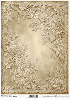 an old fashioned paper with flowers and leaves on the edges, in gold foiling