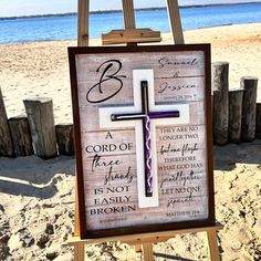 a wooden easel with a cross painted on it