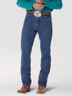 FINALLY, JEANS THAT FIT LIKE A GLOVE Wrangler® Cowboy Cut® jeans are a tried-and-true wardrobe staple for cowboys who demand a lot from their everyday clothes. Our men's Cowboy Cut® 0936 comes with all the same iconic details of the 13MWZ, including the classic neolite patch, five-pocket styling, and that signature 'W' stitching you know and trust. What makes the 0936 jean a must-have for every modern cowboy is its slim silhouette through the seat, thigh, and knee. Whether dressed up for a speci Western Style Cotton Jeans For Rodeo, Western Style Denim Blue Jeans For Rodeo, Medium Wash Jeans For Rodeo With Standard Cut Leg, Western Style Dark Wash Jeans For Ranch, Western Style Fitted Jeans With Belt Loops, Western Cotton Jeans For Ranch, Western Style Medium Wash Bottoms For Rodeo, Western Style Straight Leg Jeans For Rodeo, Western Dark Wash Jeans For Rodeo