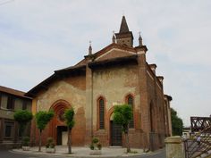 an old church with ivy growing on it's side