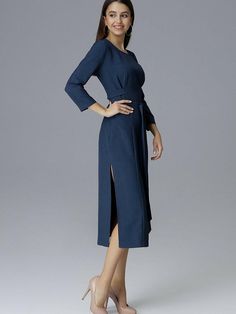 Dress over the knee with 3/4 sleeves, tied at the waist. Delicate topstitching shapes the silhouette nicely. Side slits add chic and elegance. Long Sleeve Dresses With Split Design For Spring, Spring Long Sleeve Dress With Split Design, Chic Solid Color Half Sleeve Midi Dress, Elegant Long Sleeve Dress With Split Design, Fall Workwear Midi Dress With Side Slits, Elegant Knee-length Dress With Split Design, Elegant Belted Midi Dress With 3/4 Sleeves, Chic Half Sleeve Belted Midi Dress, Elegant Long Sleeve Midi Dress With Tie Waist