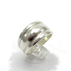 Stylish sterling silver ring 925/1000. Stamped 925. Approximate weight 7.0 grams. Top width 1.3cm. All our jewels are made from solid sterling silver 925/1000 and are carefully crafted by hand in our family workshop. We dispatch your orders in 5 working days, worldwide and the postage is $5. We ship registered priority mail. Please allow 5-7 working days for delivery in Europe and 10-15 working days outside Europe. For any questions - please do not hesitate to contact me! Silver Sterling Stackable Rings With Thick Band, Sterling Silver Ring With Thick Band Stamped 925, Sterling Silver Rings With Thick Band, Stamped 925, Sterling Silver Rings With Stamped 925 And Thick Band, Sterling Silver Rings With Thick Band, Silver Sterling Silver Rings With Thick Band, Sterling Silver Wide Band Stackable Rings, Sterling Silver Wide Band Stackable Rings With Polished Finish, Sterling Silver Hallmarked Ring With Thick Band