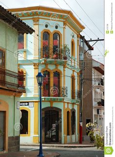 an old building with balconies and balconys in the center of a town