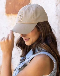 Khaki G&L Baseball Cap | Tan Baseball Cap The G&L Baseball Cap is back! This hat features soft, comfy fabric for that worn-in feeling and a university-inspired embroidered G&L logo that’s completely on trend all year long. Throw this hat on for a laid-back finish to any look! Why you’ll love it: Khaki baseball cap with university-inspired G&L dimensional embroidered logo Soft, comfortable fabric for maximum comfort Adjustable band makes it easy to adjust fit and style with a variety of looks Gra Collegiate Cotton Hats For Outdoor, Collegiate Cotton Dad Hat With Curved Brim, Casual Beige Hat With Curved Bill, Casual Hat With Letter Patch And Curved Brim, Casual Beige Snapback Dad Hat, Casual Beige Dad Hat For Everyday, Casual College Baseball Cap With Curved Bill, Casual Curved Bill Baseball Cap For College, Casual Beige Dad Hat