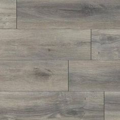 an image of wood flooring that looks like it has been painted in grey tones