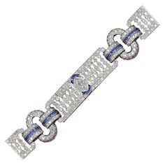 Art Deco Style, Impressive Statement Bold Bracelet. Diamonds & Blue Sapphire - All Natural. Total Diamonds 7.24 carat G-VS-SI Total Blue Sapphire 2.71 carat. 18k White Gold 34 grams Bracelet Width 13 mm Victorian Princess, Diamond Bracelet Design, Bracelet Design, Estilo Art Deco, Art Deco Diamond, Women Diamond, Art Deco Style, Deco Style, Bracelet Designs