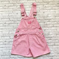 Y2K earlier 2000's Oshkosh denim pink striped Shortalls.  Tagged size girls 6, measuring approximately 22" STS, 3" inseam, 12" across the chest.  No flaws found Striped Cotton Overalls For Spring, Casual Pink Shortalls, Casual Pink Cotton Shortalls, Pink Shortalls With Pockets, Pink Cotton Casual Shortalls, Spring Striped Cotton Overalls, Pink Cotton Shortalls With Pockets, Casual Pink Overall Shortalls, 2000s Kid Clothes