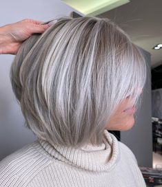 40 Bombshell Silver Hair Color Ideas for 2023 - Hair Adviser Icy Blonde Hair With Shadow Root Bob, Short Platinum Hair With Bangs, Grey Hair With Highlights And Lowlights, Lowlights On Grey Hair, Grey Lowlights, Short Gray Hair Styles, Dark Silver Hair, Latest Bob Hairstyles, Silver White Hair