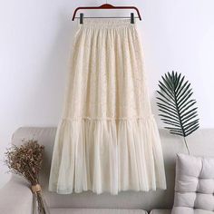 Beige Lace Skirt With Lace Patchwork, Summer Lace Maxi Skirt With Ruffled Detail, Lace Ruffled Maxi Skirt For Summer, Feminine Beige Lace Skirt, Summer Lace Long Skirt, Summer Long Lace Skirt, Beige Flowy Lace Skirt, Long Lace Skirt For Summer, Lace Patchwork Skirt For Spring