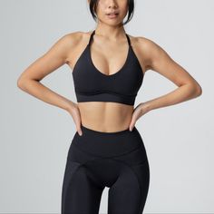 Nwot Condition. The Sultry Sports Bra Is A Medium Support Bra With A Curved Underbust Binding Detailing That’s Sure To Highlight Your Best Features. It Has A Deep V Neckline And An Adjustable, Removable Racerback Strap For You To Decide Which Look You Like Best! Black Bra For Pilates, Stretch T-back Bra For Athleisure, Black Activewear With Medium Bust Support For Pilates, Black Stretch Bra For Pilates, High Stretch Athleisure Bra, Sporty Bra For Loungewear, Stretch Black Bra For Pilates, Workout Bra With Built-in Padding, Fitted T-back Sports Bra