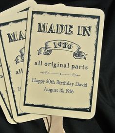 three old fashioned birthday cards are on a wooden stand with ribbon around the edges, and an ad for made in 1950