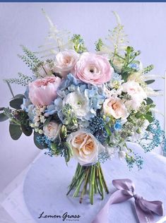 a bouquet of flowers sitting on top of a table