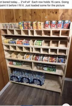 a wooden shelf filled with lots of food