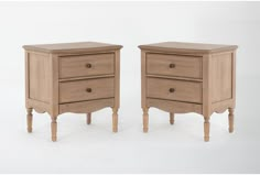 two wooden nightstands sitting side by side against a white background