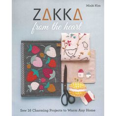 the cover of zakka from the heart book with scissors and other sewing supplies on it